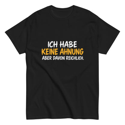 Lustiges T-Shirt mit dem Spruch „Ich habe keine Ahnung, aber davon reichlich.“ in weißer und gelber Schrift auf schwarzem Hintergrund.