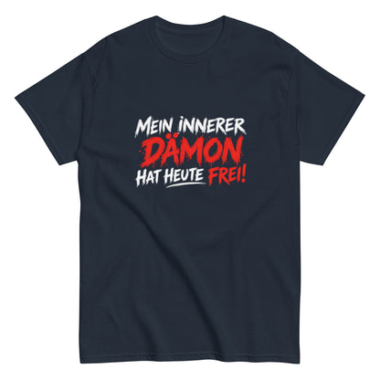 T-Shirt mit dem lustigen Spruch „Mein innerer Dämon hat heute frei!“ in schwarzer und orangefarbener Brush-Schrift.