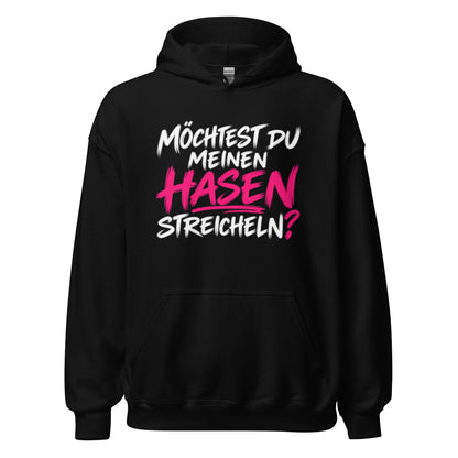 Lustiger Hoodie mit dem frechen Spruch „Möchtest du meinen Hasen streicheln?“ in schwarzer und pinker Schrift.
