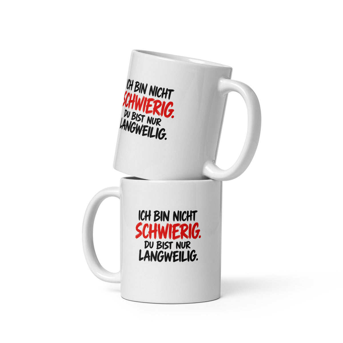 Lustige Kaffeetasse mit dem Spruch „Ich bin nicht schwierig. Du bist nur langweilig.“ in weißer und roter Schrift auf schwarzem Hintergrund.