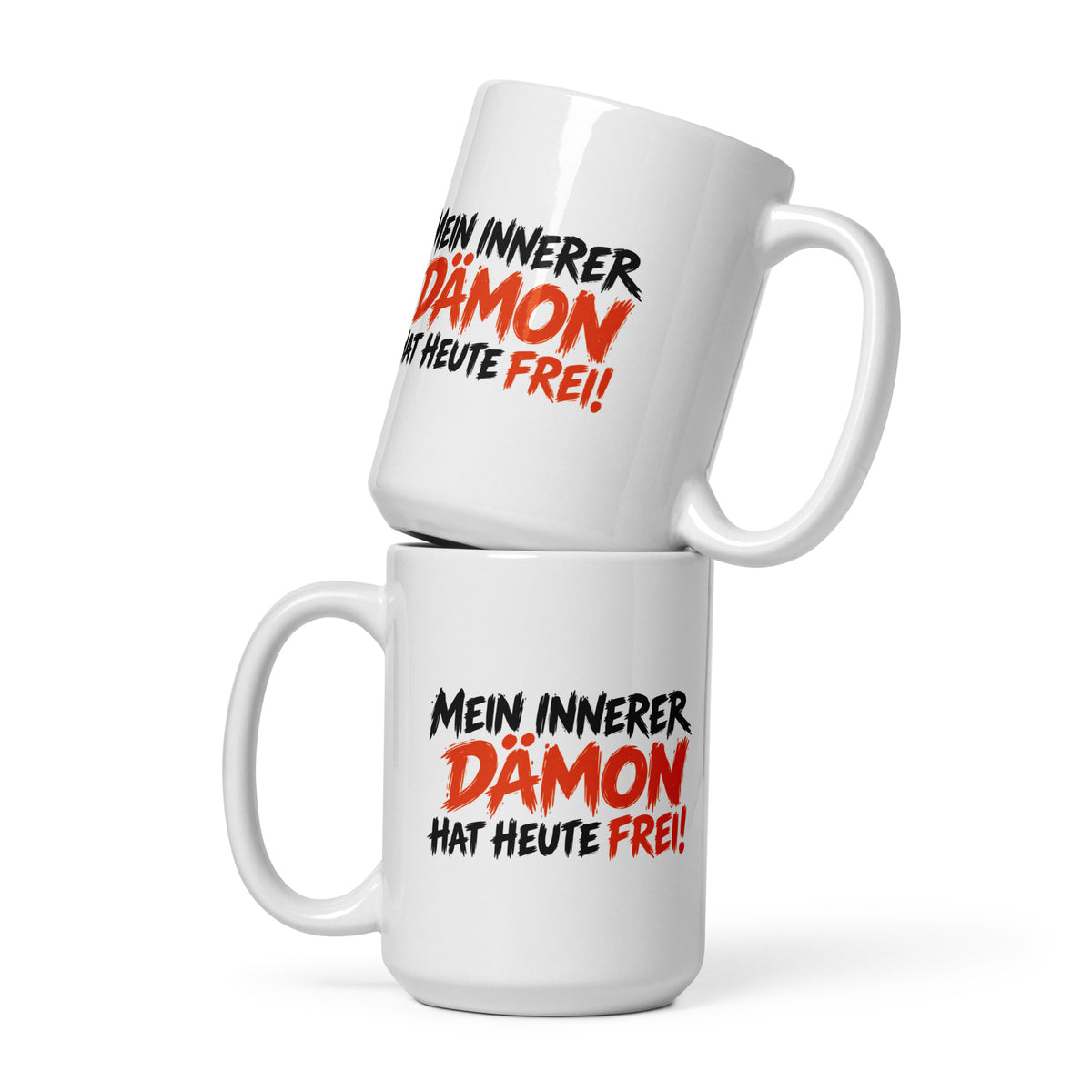 Weiße Keramiktasse mit schwarzem und orangefarbenem Spruch „Mein innerer Dämon hat heute frei!“ – lustige Tasse mit schwarzem Humor.