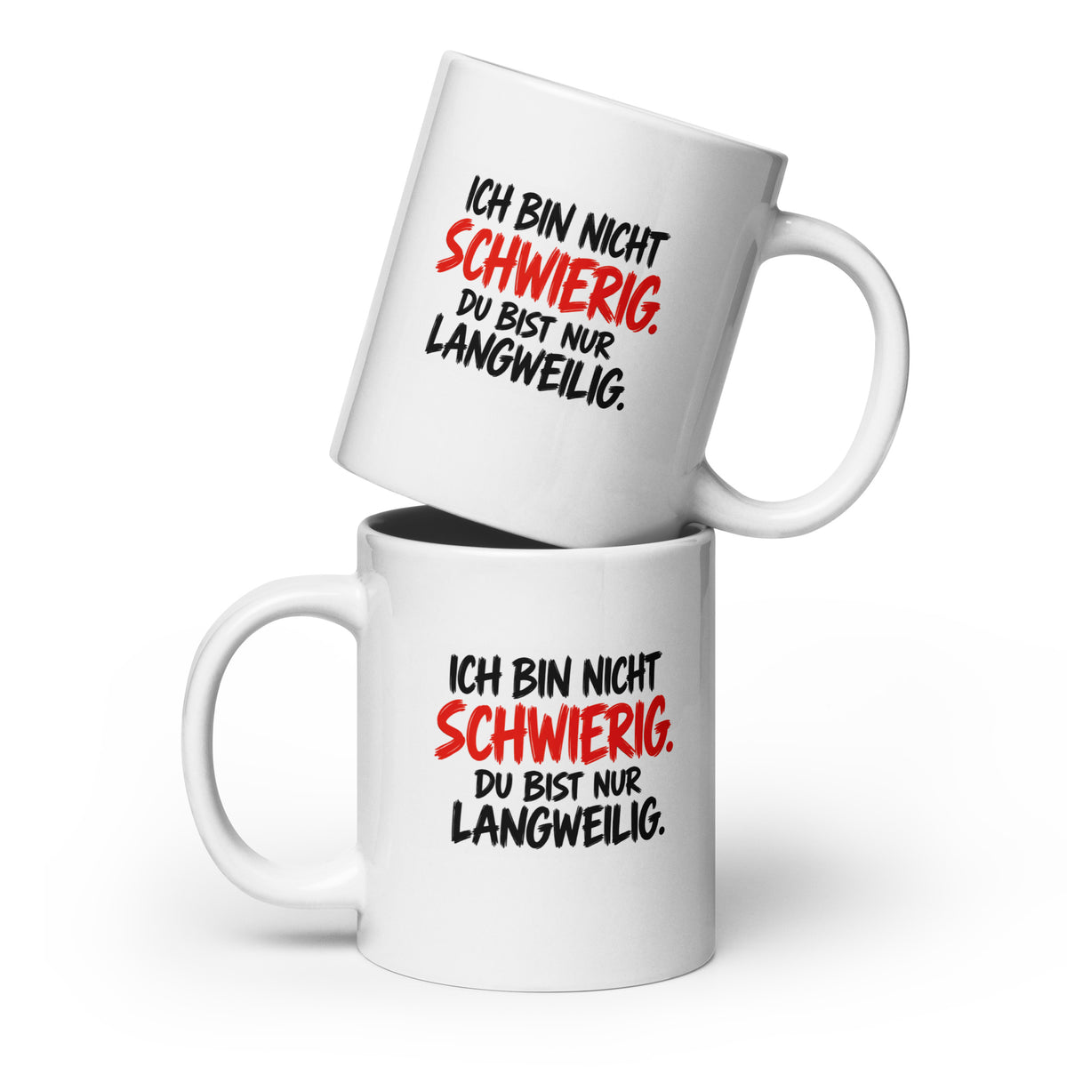 Lustige Kaffeetasse mit dem Spruch „Ich bin nicht schwierig. Du bist nur langweilig.“ in weißer und roter Schrift auf schwarzem Hintergrund.